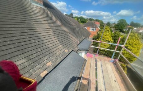 Pristine finished full roof replacement on a Sunderland property showcasing straight tile lines, low-maintenance dry ridge systems & new leadwork valleys.