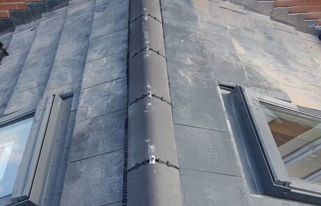 Finished re-tiling roof in Sunderland Damaged roof tiles being replaced during a roof repair project in Sunderland