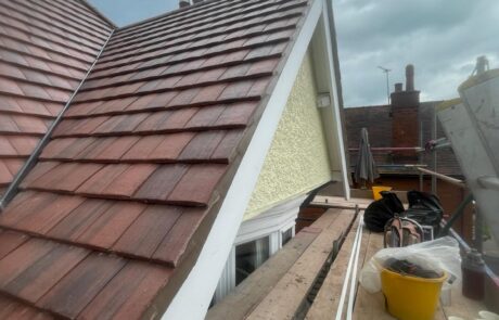 Structural re-roofing project on a Northumberland property showing fresh timber battens & heavy-duty breathable underlay installed on the rafters.